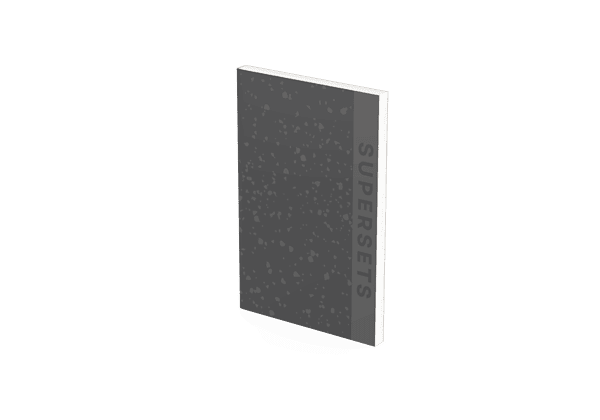 A gray notebook titled 'SUPERSETS' on the spine stands upright against a black background, embodying the essence of fitness journals.